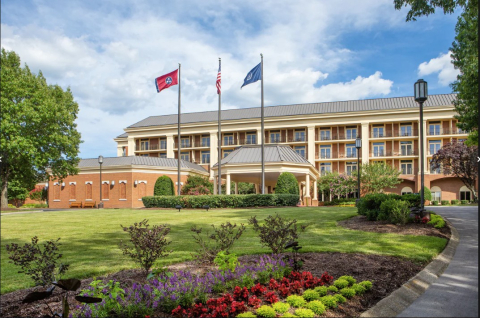 Sheraton Music City building with green grass campus